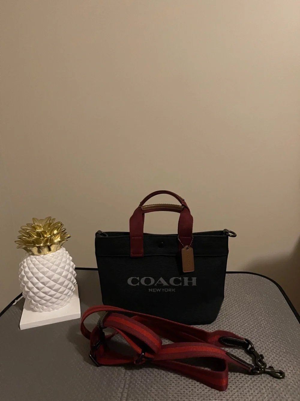Unisex Coach Black Canvas Messenger Tote. Burgundy Handles & Red Striped Strap.